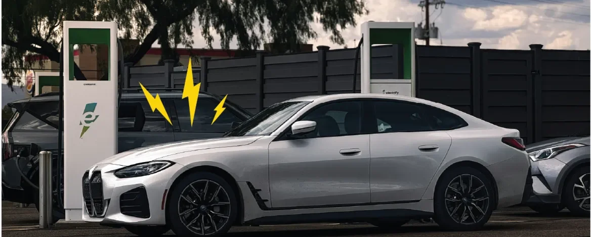 A white EV charging with image accents