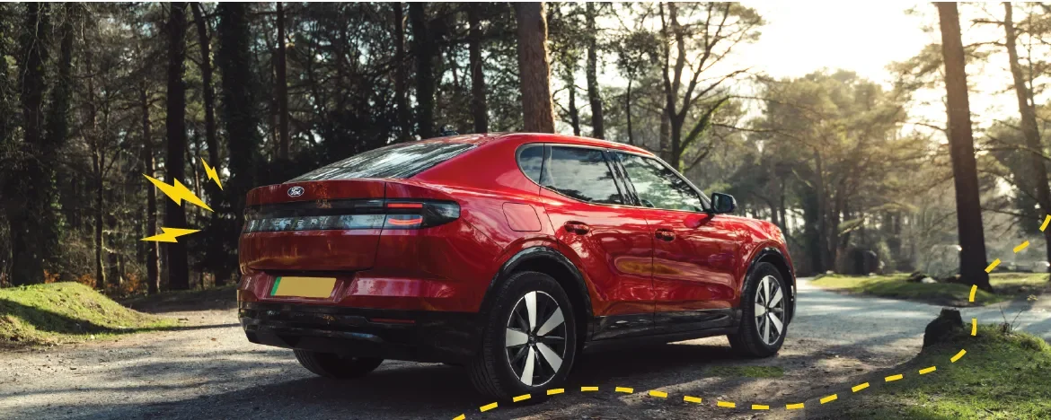 The new Ford Capri parked in the forest with yellow accents
