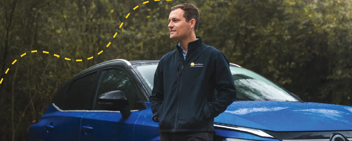 Man stood outside Nissan Qashqai