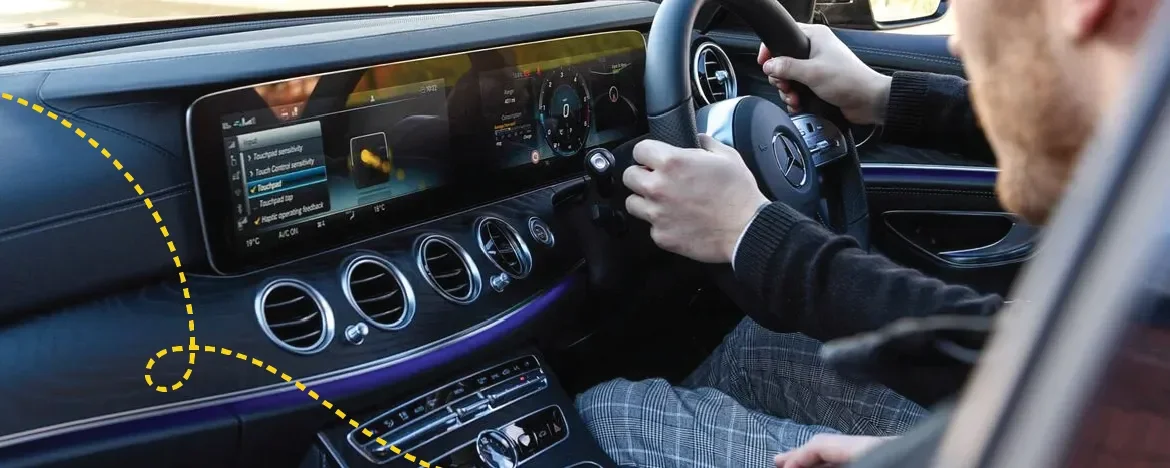 Men driving a car