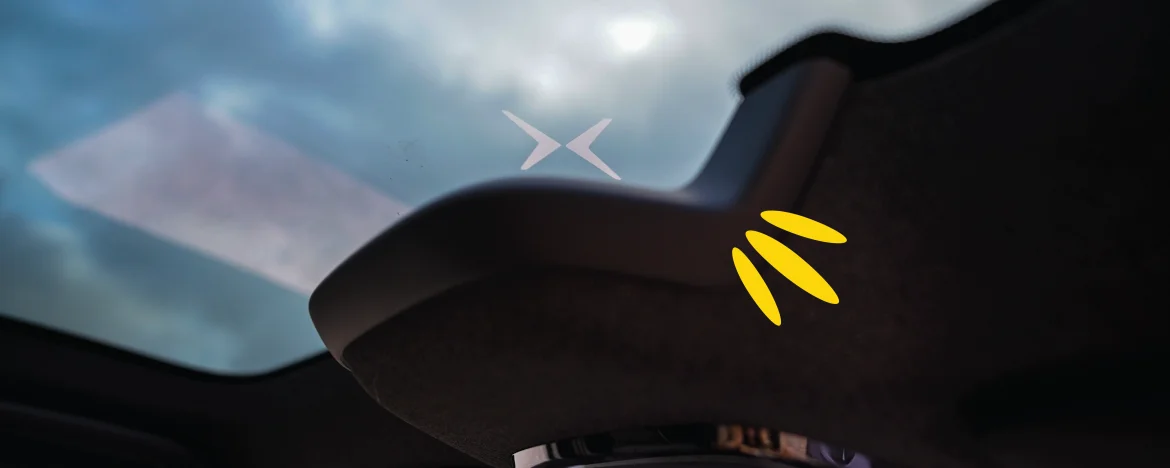 Polestar 2 logo projected onto panoramic sunroof