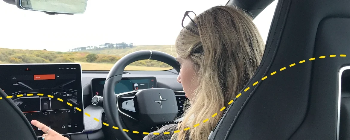 Young woman in driving seat