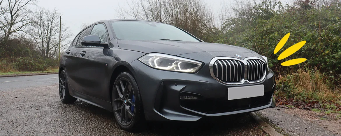 BMW 1 Series parked side view