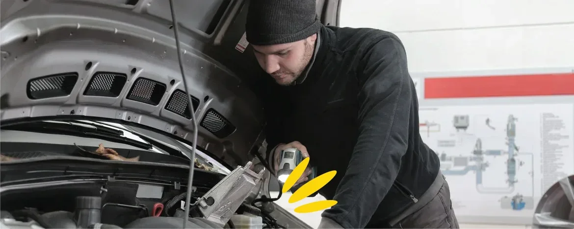 Man looking at engine
