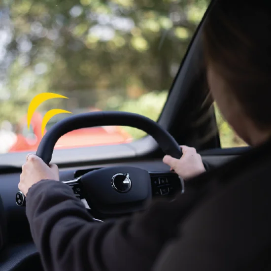 Woman driving a Volvo