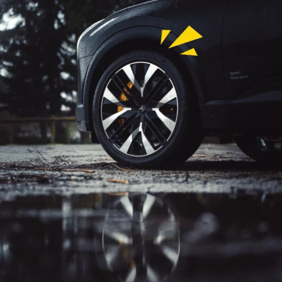 Polestar 2 wet tyre with reflection in puddle