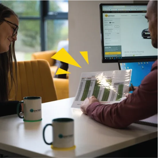 Business meeting at desk